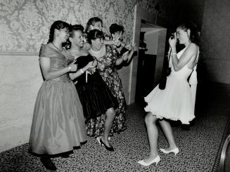 For the album: Dimitra Lamprov, 19, snaps a picture of her Northern Secondary School friends at the Royal York, where their prom was held this year