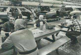 Lunch beside the line saves time for GM assembly workers