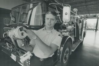 Camera man: Oshawa Firefighter Bob Heurkens holds thermal camera