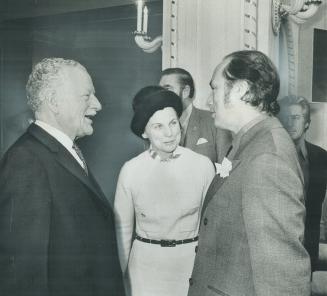 A journalist and broadcaster from Ahuntsic, Jeanne Sauve, the minister of state for science and technology, talks with Governor-General Roland Michene(...)