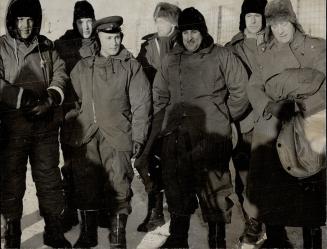 Among attaches viewing previous winter manoeuvres, the Russian representative can be seen third from left