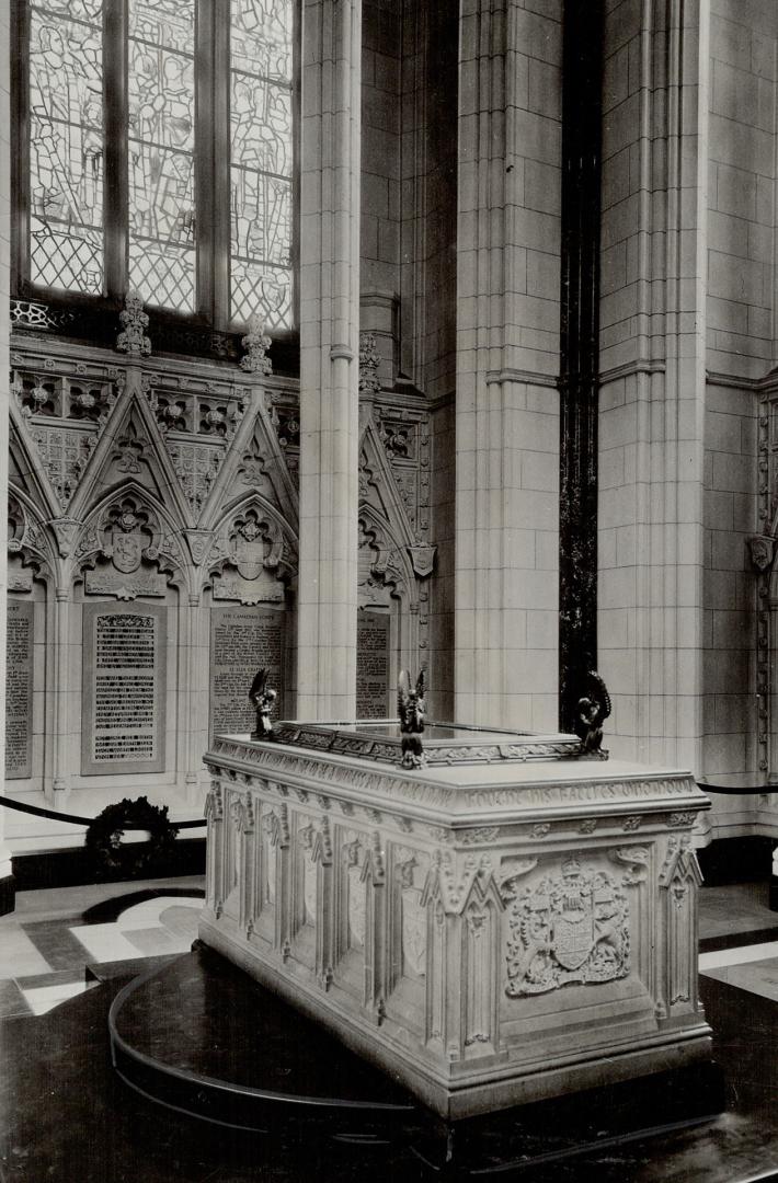 The book rests under glass in a special altar in the peace tower (right)