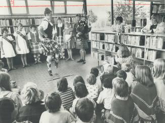 She's dancing by the books: sword dance in McGregor Park library