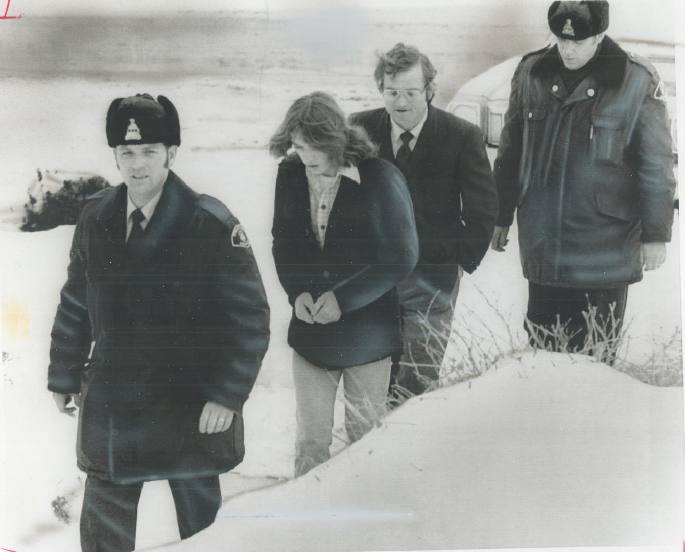 On way to inquest, Constables Jerry McEwen, left, and Robert Admans escort correctional officer Ed Czajkowski and prisoner Richard Beavans. Beavans, i(...)