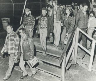 Miners come off shift after learning that Inco, the giant nickel producer at Sudbury, was cutting work force after drop in profit