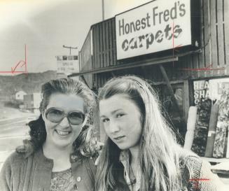 Clara Bolt, left, stands outside Sudbury carpet store with daughter Darlene