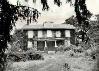 Historic house gutted: This three-storey, fieldstone farmhouse built in 1841 has been gutted by vandals and neglected because the T