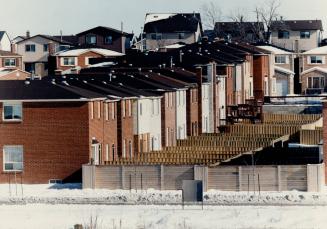 Housing boom: Rows of houses are springing up all over Scarborough, as on McCowan Rd