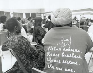 Working together: Jaipaul Singh, a student at L'Amoreaux Collegiate in Scarborough, wears a sweatshirt that reflects the spirit of a well-adjusted multicultural society