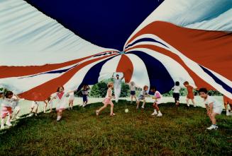 Parachuting into summer. This Junior Kindergarten class at Brooks Road Public School in Scarborough had some fun with this parachute as the school yea(...)