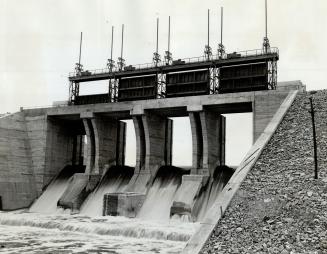 The dam is 72 feet high, 300 feet wide at the base, and more than a third of a mile long