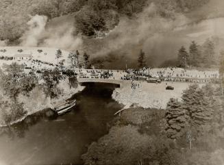While guns roared a salute Mr. Roosevelt and Mr. King opened the Thousand Islands bridge system on this 90-foot span through which the boundary passes