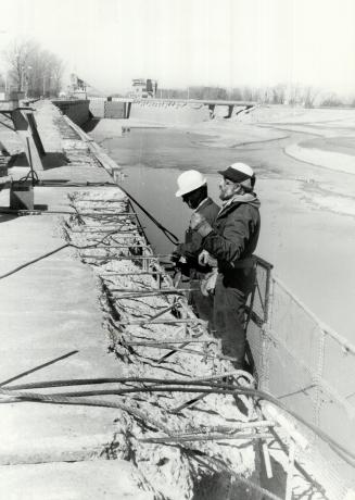 Maintenance workers are getting a battered Welland Canal shipshape for another navigation season