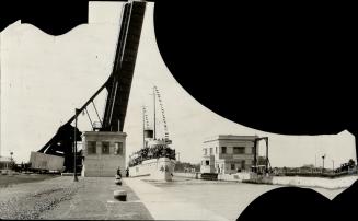 Here we see the S.S. Northumberland, a picturesque white, coming through one of the locks of the Welland Canal [Incomplete]