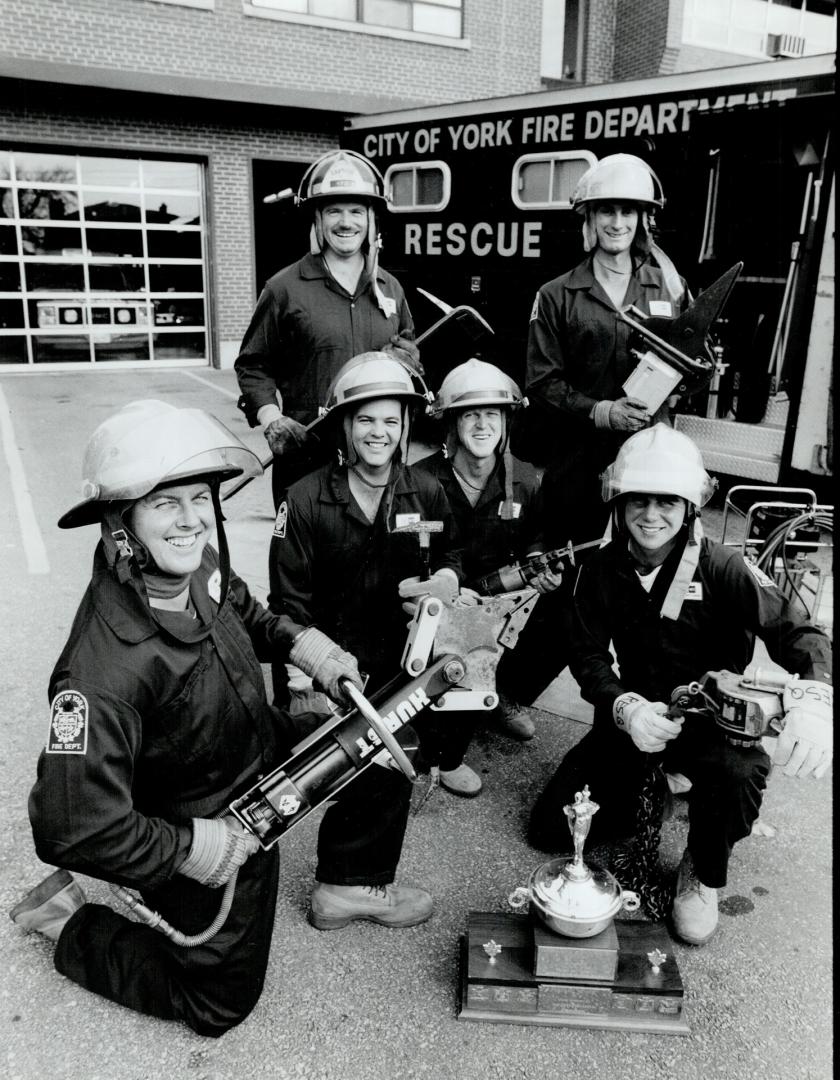 Rescue team's winning style. City of York firefighters form a mock rescue unit yesterday to show how they won an international competition of rescuing(...)