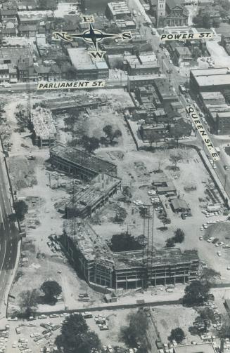 Aerial view of high-rise construction site looking toward Parliament Street. Street names are p ...
