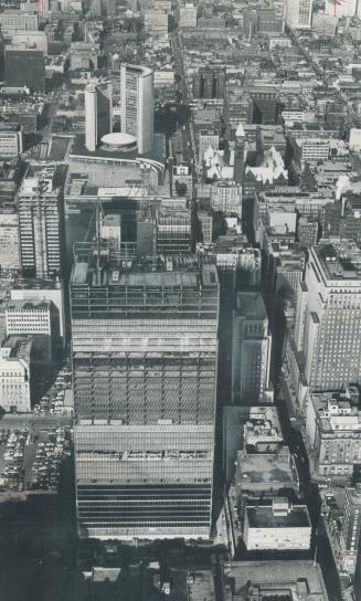 It's a tall a tall story, The Toronto-Dominion Centre's main tower-shown here dominating the city's northern prospect-is expected to claim the crown f(...)