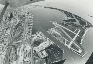Island Airport with Centre Island and downtown (l)