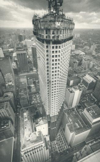 53 storeys and rising. The Scotia Plaza Tower will be 68 storeys high when it is completed about the end of this year. The first 23 floors are already(...)