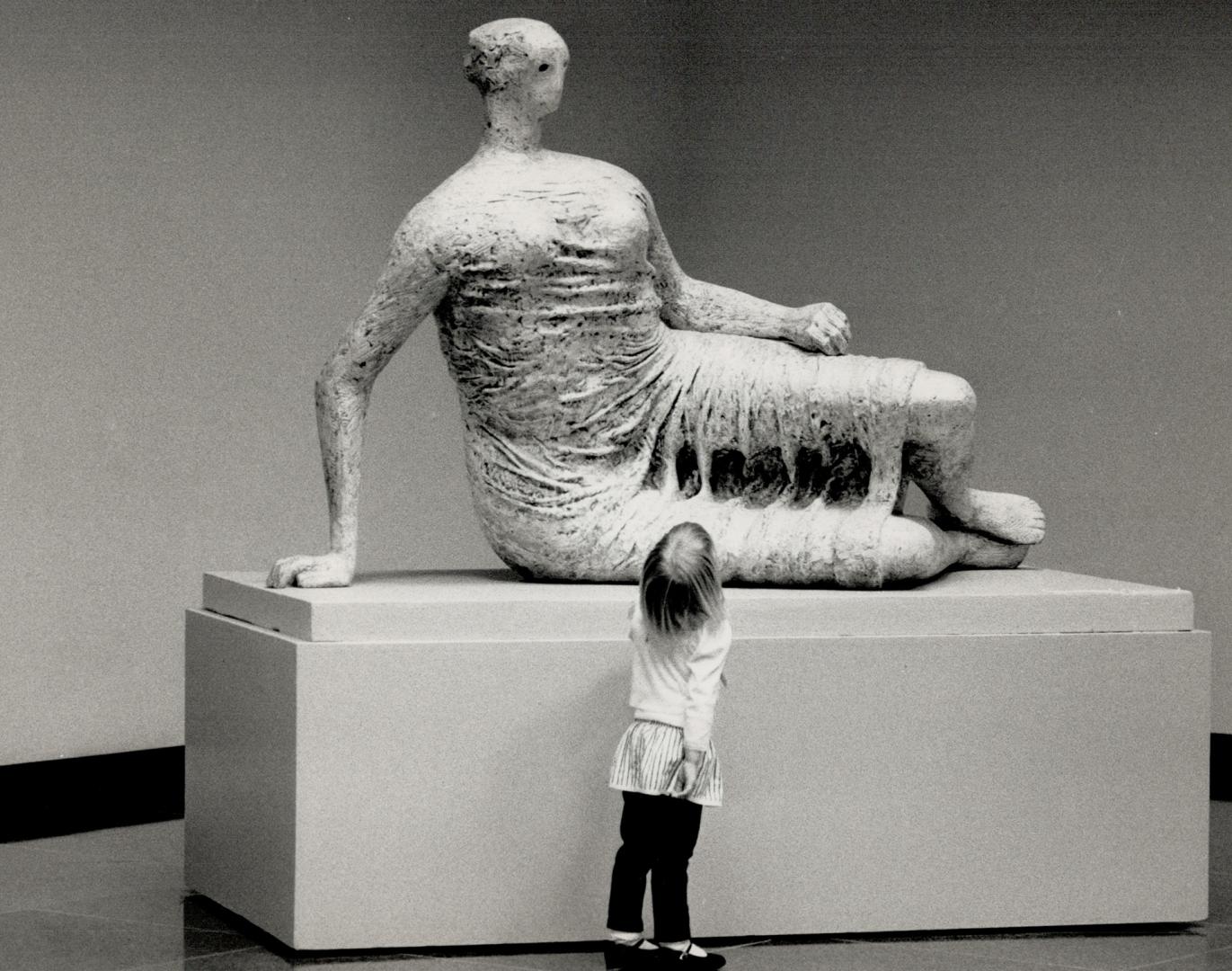 Where's mom? Elizabeth Benclokowski, 4, (far right) takes a moment to ponder over a Henry Moore sculpture