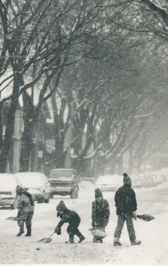 Children at the Beaches try to clear Wineva Ave