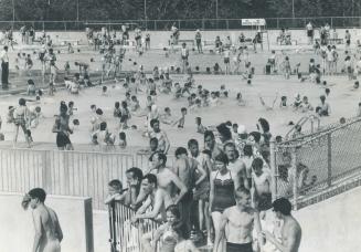 First hot-weather weekend for Olympic swimming pool at Woodbine beach, opened a week ago, found business booming