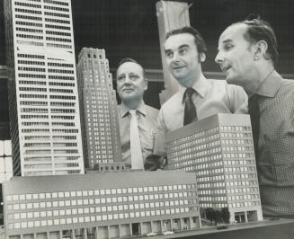 Steve Waring Associates are the biggest little builders in the city; from left Derek Baker and Steve Hoffman, partners, and Steve Waring, president, with the model of Toronto's Commerce Court project