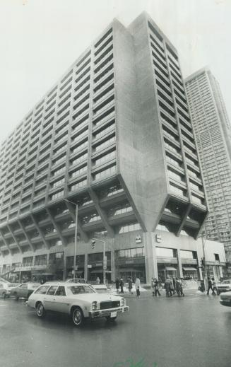 Multi-use buildings such as the ManuLife Centre, with its shops, offices, and apartments, would be encouraged under Toronto's proposed development plan. But builders say they're sceptical