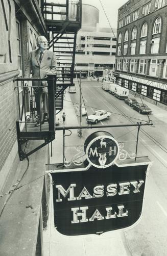Massey Hall President Edward Pickering stands on one of the five escapes at old Massey Hall on Shuter St