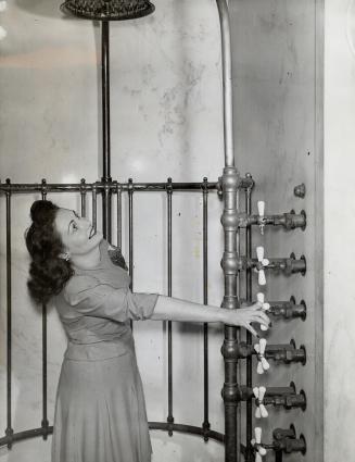 Swank shower with seven faucets for seven perfumes is about all that remains