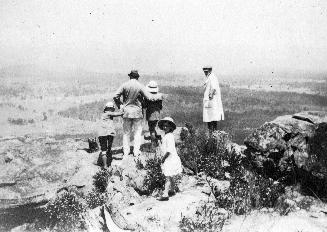 Arthur Conan Doyle and his children view the sandstone bluffs at the Blue Mountains, Australia, January 1921