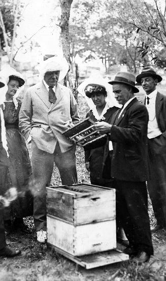 Arthur Conan Doyle at Redbank Plains apiary near Brisbane, Australia, 1921