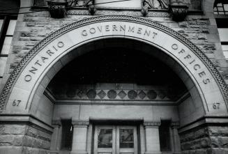 Archway over door 67 College St (old Sick Kids Hosp) and now reverted back to Govt offices Corner College and Elizabeth Sts Travel and Publicity Energy Board etc now in here