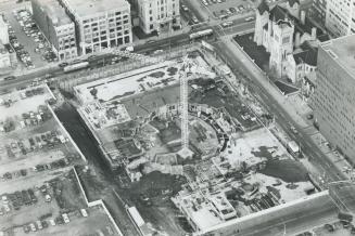 Historic photo from 1980 - Roy Thomson Hall - Construction crane in centre of building pit in King Street West
