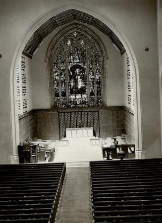 The new chancel and sanctuary (right) have been made possible by extending the length of the church 62 feet