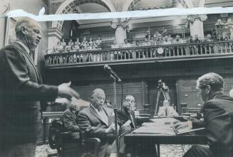 C. S. Jackson, electrical workers president, protests to board of control, Controller Lamport (seated left), Mayor Summerville (right) listen