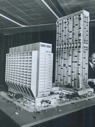 Towering model of twin-tower $48 million re-development project proposed for the block bounded by Bloor, Bay, Charles and Balmuto streets was unveiled(...)