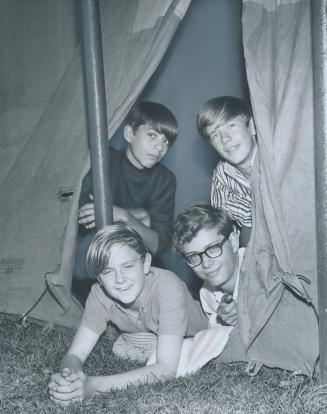 Taking no chances, Dan Horishney, 16, Brain Wisdom, 15, Eric Osborne, 17, and Dave Morris, 15, pitched their tent in the shade of Princes' Gate yester(...)