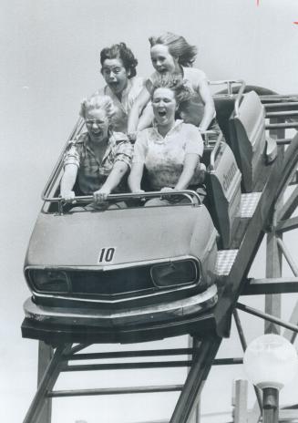 Still a thrill, The Ex means the midway and its 86 stomach-churning rides to most young visitors - and these young women are no exception