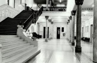 Grand Interior: Curving staircase, marble pillars and terrazo flooring are beauty points of old city hall that have led admirers to fight for building's preservation over the years