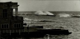 Breakers ride high when a gale from the south hits the breakwater near Argonaut Rowing Club, Toronto