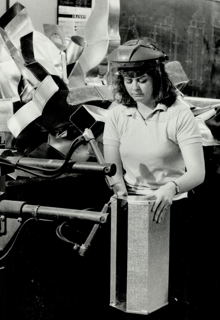 Practical Skills: George Brown College students learn skills such as sheet metal working (above), baking (for the college's 20th anniversary in 1988) and denture therapy