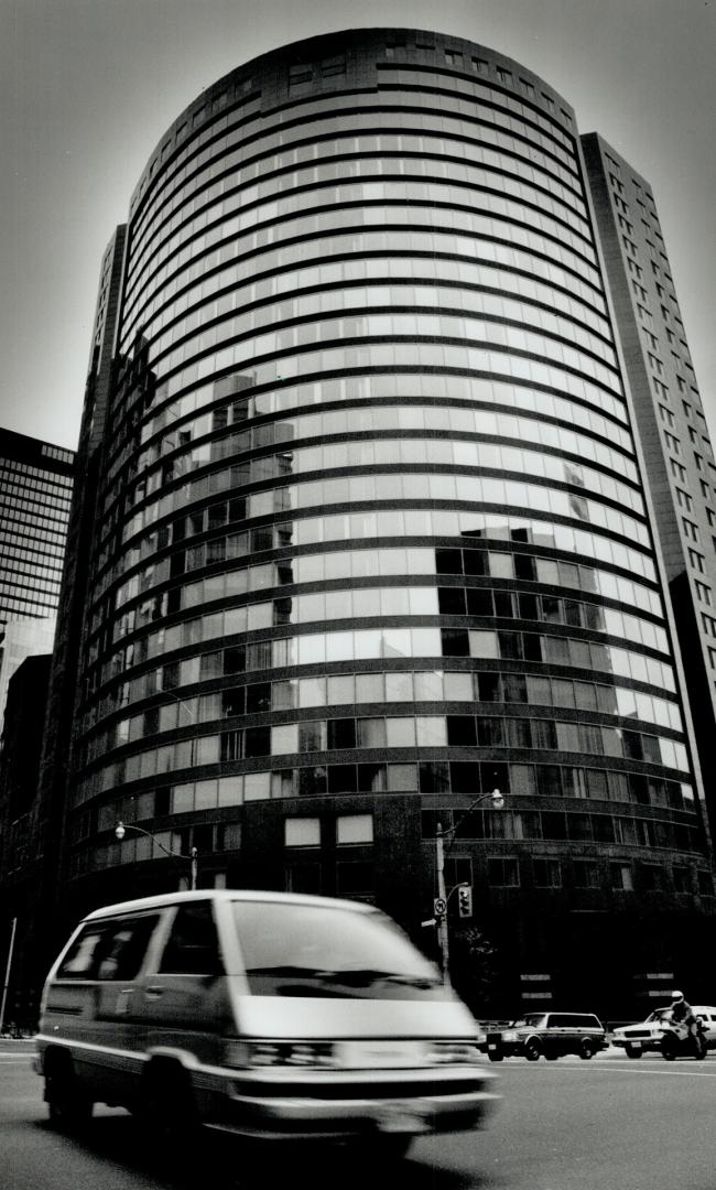 Empire Plaza, a granite condo looms over the southeast corner of University