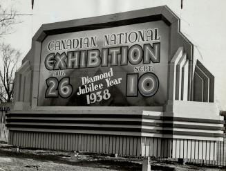 This sign, of the new glowing type, invites all and sundry to the 1938 Canadian National Exhibition