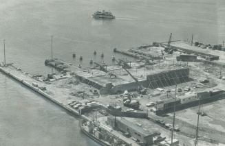 Construction on new Ferry Dock sails on smoothly, Pushing out into the waters of Toronto Harbor at the foot of Yonge St