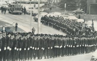 600 firemen honor a fallen comrade, More than 600 firemen, some from as far away as Windsor, Montreal and Cleveland, march along Bloor St. W. in the f(...)