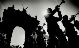 Military beat: One of the bands in the Warriors' Day Parade marches through the Princes' Gates heading towards Exhibition Stadium