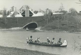 Cruising through Ontario Place, a large canoe is paddled by a group of youths along one of the many lagoons on the 96-acre site. Boat traffic along th(...)
