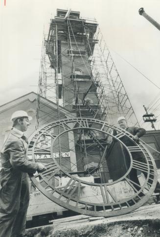 New clock for a landmark, Steve Dain and Jack Nichols, here from London to install a new clock atop the tower of No