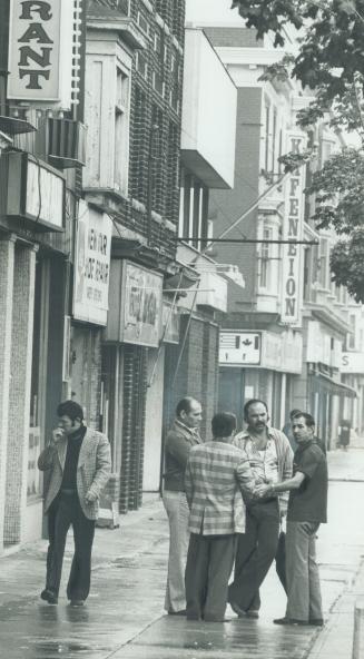 Chatting on the street in the Danforth Ave